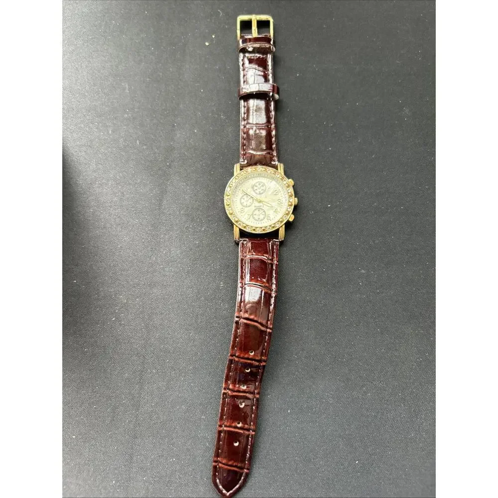 Gold Tone Pearlized Dial Women’s Quartz Watch